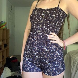 Navy floral overall jumper/romper